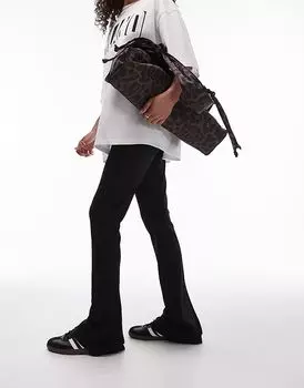 Узкие расклешенные брюки в рубчик черного цвета Topshop