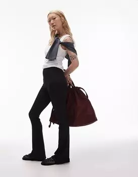 Узкие расклешенные брюки в рубчик черного цвета Topshop