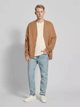 Узкие зауженные джинсы с этикеткой Calvin Klein Jeans