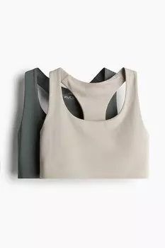 В упаковке 2 спортивных бюстгальтера средней поддержки. H&M, хаки