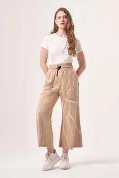 Вязаные бежевые брюки батик Mizalle