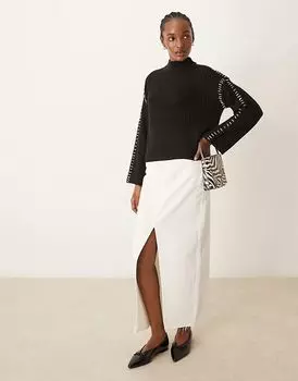 Вязаный джемпер с высоким воротом и контрастной строчкой черного цвета Vila