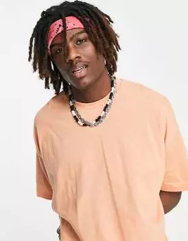 Выбеленная оранжевая футболка оверсайз с круглым вырезом ASOS DESIGN