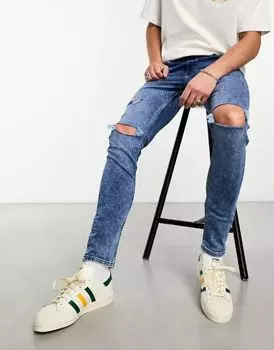 Выцветшие синие джинсы скинни ASOS с рваными коленями