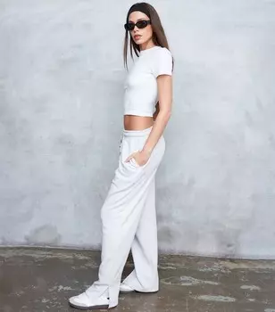 WKNDGIRL Серые джоггеры с разрезом на подоле WKNDGIRL, серый