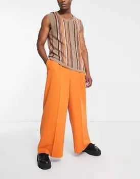 Ярко-оранжевые элегантные брюки чрезвычайно широкого кроя ASOS DESIGN