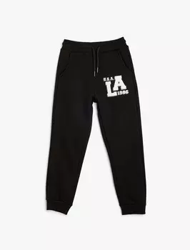 Зауженные брюки Koton, черный