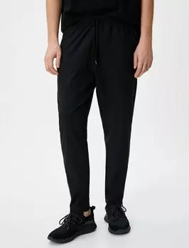 Зауженные брюки Koton, черный