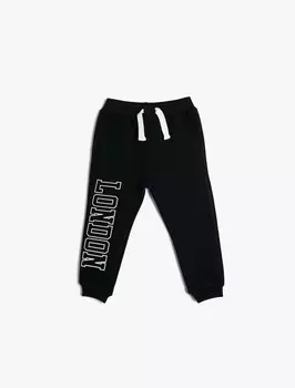 Зауженные брюки Koton, темно-синий