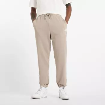 Зауженные брюки new balance, кремовый