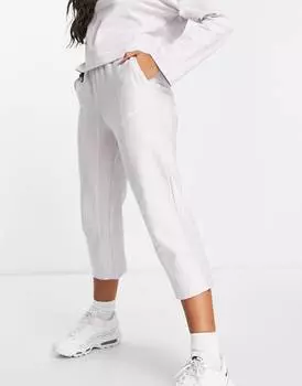 Зауженные брюки Nike Lounge в сиреневую и белую полоску