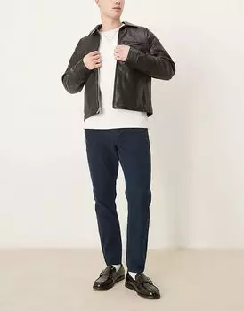 Зауженные брюки вельветового кроя в темно-синем цвете ASOS DESIGN