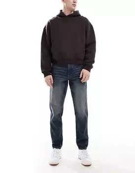 Зауженные джинсы ASOS DESIGN темно-синего и потертого цвета