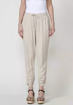 Зауженные джинсы Koroshi, цвет Piedra Stone