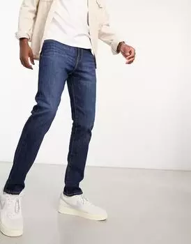 Зауженные джинсы Levi's 512 выцветшего темно-синего цвета с облегающим кроем