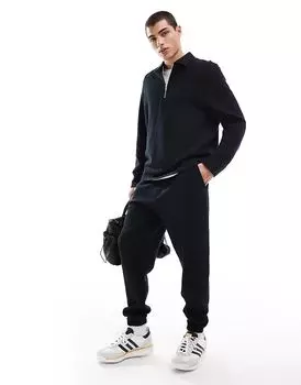 Зауженные книзу брюки-джоггеры черного цвета ASOS DESIGN