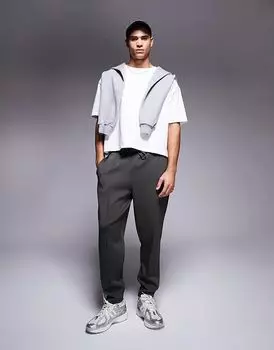 Зауженные книзу спортивные штаны цвета хаки ASOS DESIGN