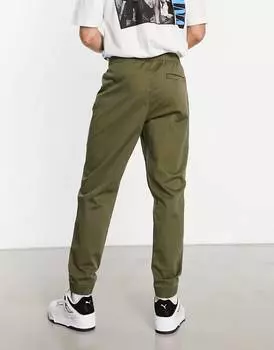 Зеленые брюки чинос с карманами Levi's