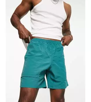 Зеленые шорты New Balance