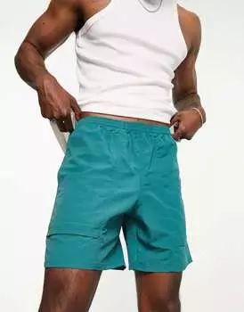 Зеленые шорты New Balance