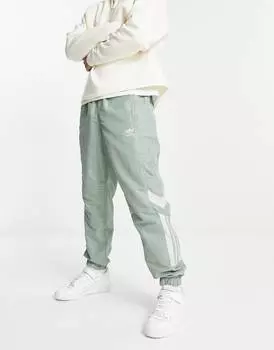 Зеленые спортивные штаны adidas Originals Rekive