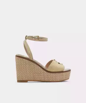Женские босоножки на танкетке из золотой ткани Aldo