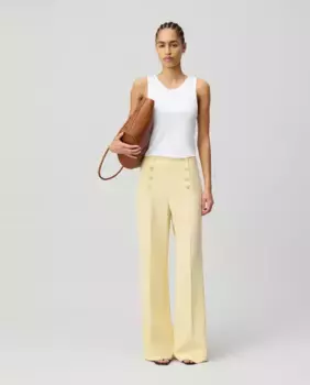Женские брюки прямого, слегка расклешенного покроя с застежкой на пуговицы понтового типа Claudie Pierlot, жёлтый
