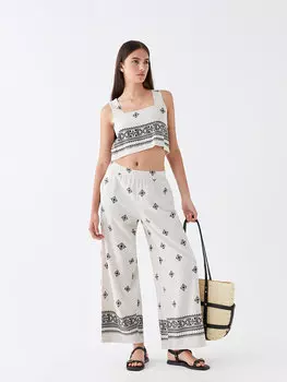 Женские брюки с рисунком и эластичной резинкой на талии CALMERA MODA