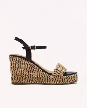 Женские кожаные босоножки на танкетке с плетением и регулируемой застежкой Gioseppo, черный