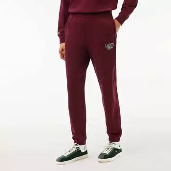 Женские спортивные штаны с логотипом красного цвета Lacoste