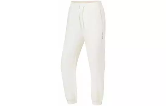 Женские трикотажные спортивные штаны LiNing Fitness Series цвета слоновой кости