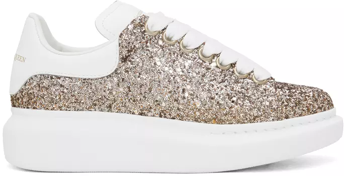 Золотые массивные кроссовки Alexander McQueen