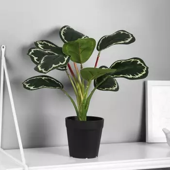 Искусственный цветок в горшке