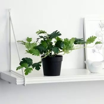 Искусственный цветок в горшке