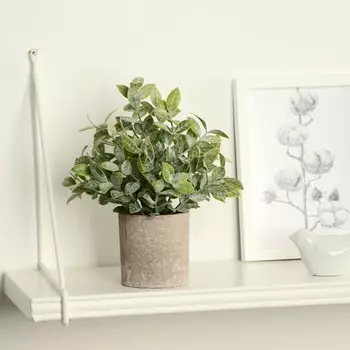 Искусственный цветок в горшке