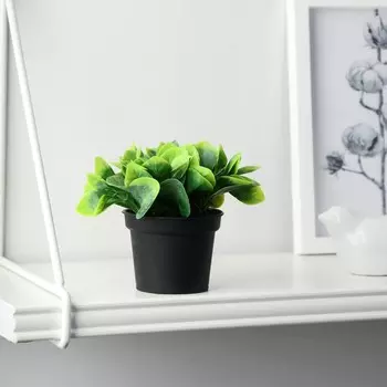 Искусственный цветок в горшке