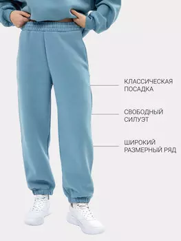 Брюки женские теплые в зеленом цвете