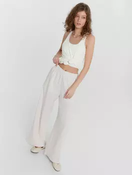 Брюки женские в бело-бежевом цвете изо льна и района