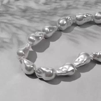 Бусины пластиковые на нити