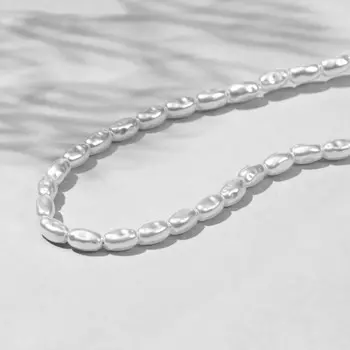 Бусины пластиковые на нити