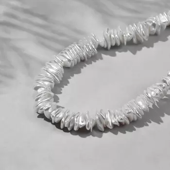 Бусины пластиковые на нити