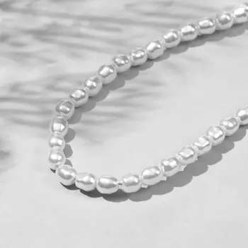 Бусины пластиковые на нити