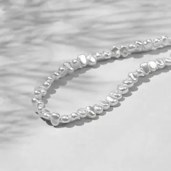 Бусины пластиковые на нити