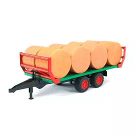 Прицеп Bruder для перевозки рулонов сена с 8 рулонами