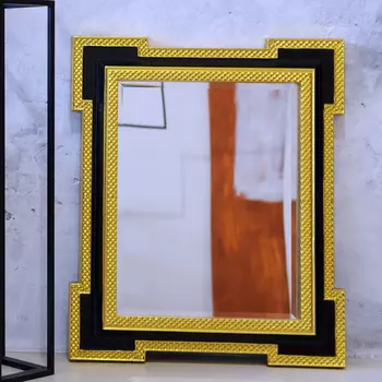 Настенное зеркало армандо в раме черно-золотистого цвета