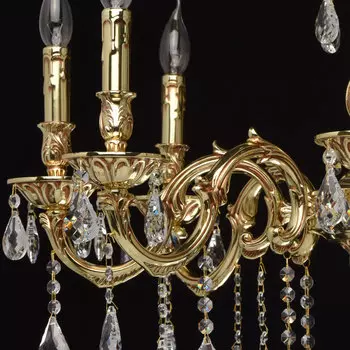 Подвесная люстра свеча золотого цвета