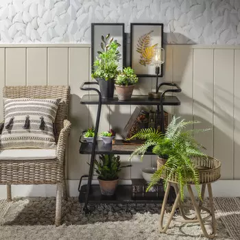 Стол сервировочный на колесах черного цвета