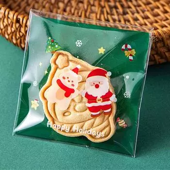 100 шт. 2025 Рождественские подарочные пакеты Пластиковые самоклеящиеся пакеты для упаковки конфет, печенья, закусок, сувениры для рождественской вечеринки, украшения 100Pcs