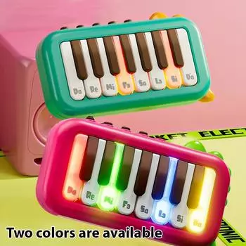 15-клавишное карманное пианино Мини-электронное пианино Переключение одним щелчком между 3 различными тонами Подсвеченные клавиши Интересный портативный мюзикл красный