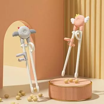 1 пара палочек для еды для малышей, съемные портативные многоразовые корректирующие палочки из полипропилена, тренировочные палочки для еды с героями мультфильмов, аксессуары для детей розовый